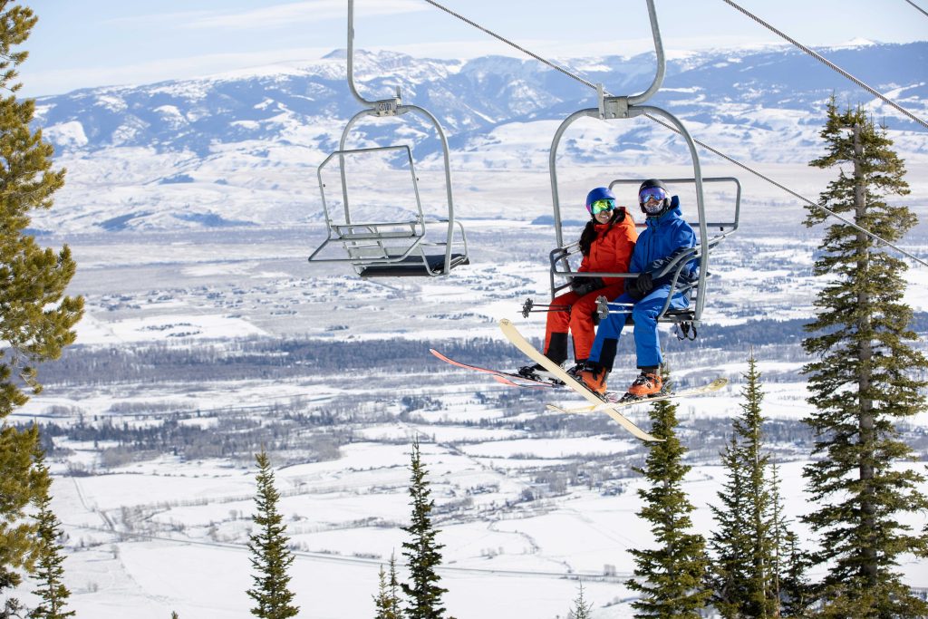 Photo of skiers on chairlift